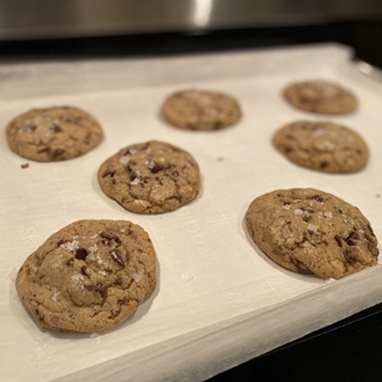 Photo of chocolate chip cookies topped with flaked sea salt